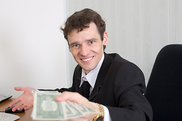 Image showing The man with money in hands