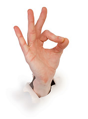 Image showing Gesture male hand through white paper