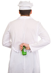 Image showing Cook with green bottle