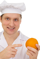 Image showing Cook with orange in hand