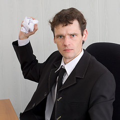 Image showing Director throwing crumpled paper