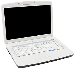 Image showing The old white laptop