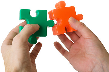 Image showing Hand and puzzle