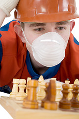 Image showing Worker and chess