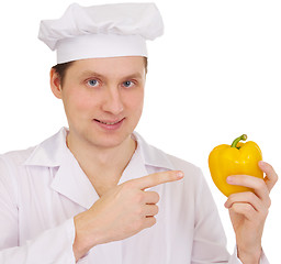 Image showing Cook with yellow paprica in hand
