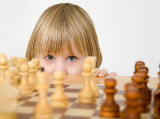Image showing Little girl and chess
