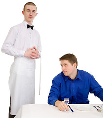 Image showing Waiter and guest of restaurant