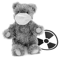 Image showing Toy bear and sign to radiation