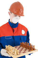 Image showing Labourer with chess 