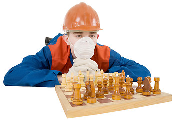 Image showing Builder and chess