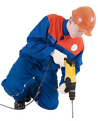 Image showing Labourer with hand drill 