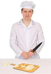 Image showing Cook with knife and preparation board