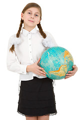 Image showing Schoolgirl hold terrestrial globe