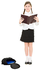 Image showing Schoolgirl reading book
