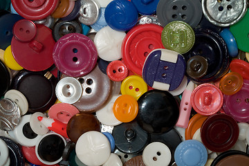 Image showing  Multicolored plastic and metal button