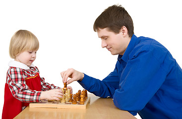 Image showing Man and child play chess