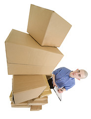 Image showing Man and pile cardboard boxes