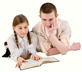 Image showing Man and girl reading book 