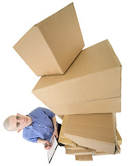 Image showing Man and pile cardboard boxes