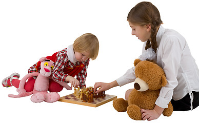 Image showing Girls play chess