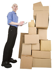 Image showing Man and pile cardboard boxes