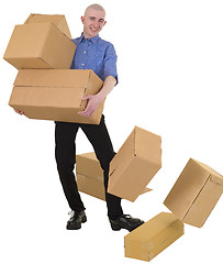 Image showing Man drops cardboard boxes