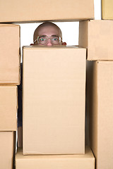 Image showing Man and cardboard boxes