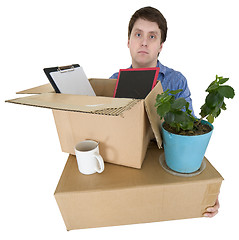 Image showing Man moves in other office