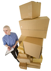 Image showing Courier and pile cardboard boxes