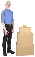 Image showing Man in overalls and cardboard boxes