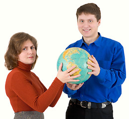 Image showing Man and woman hold globe