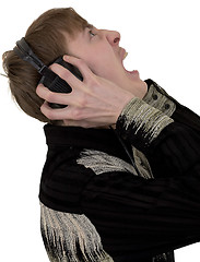 Image showing Person in ear-phones shouting