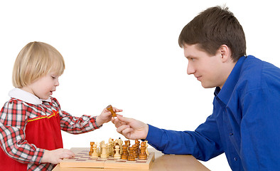 Image showing Man give child chess-man