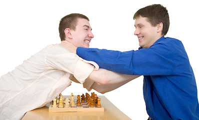 Image showing Wrestling boys ang chess