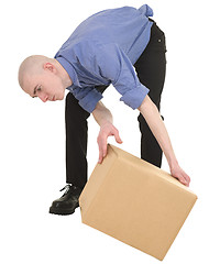 Image showing Man looking under cardboard box