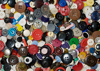 Image showing Multicolored plastic and metal button background