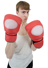 Image showing Thin boxer in red gloves