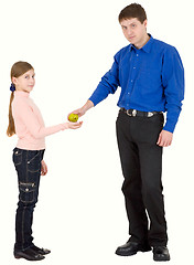 Image showing Man give apple to girl