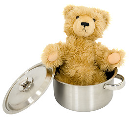 Image showing Toy brown bear in saucepan