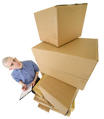 Image showing Messenger and cardboard boxes and tablet