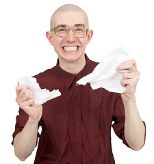 Image showing Man tear to pieces paper