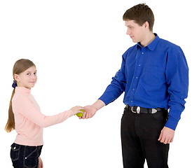 Image showing Man give apple to the girl