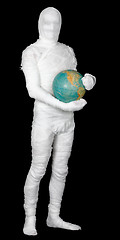 Image showing Man in costume mummy and terrestrial globe