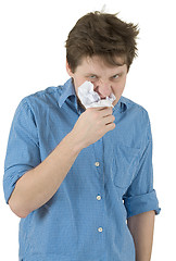 Image showing The man a chewing sheet of paper