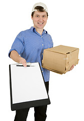 Image showing Man with tablet and cardboard box