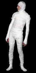 Image showing Guy in bandage upright on a black