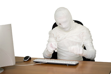 Image showing Mummy is working on computer