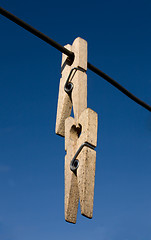 Image showing Two wooden clothes-peg