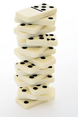 Image showing Tower from bones of a dominoes