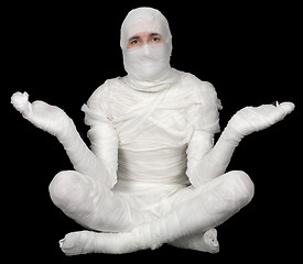 Image showing Man in bandaged sit on pose lotus